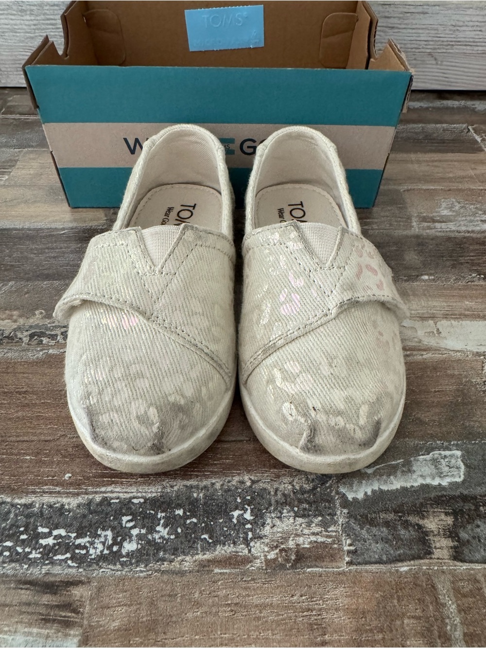 TOMS incandescent white Kids Slip-On Shoes with Subtle Leopard Print